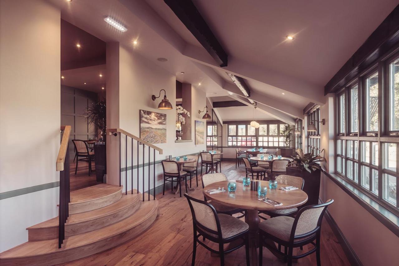 Longlands Inn & Cottages Карнфорт Экстерьер фото The restaurant at the hotel