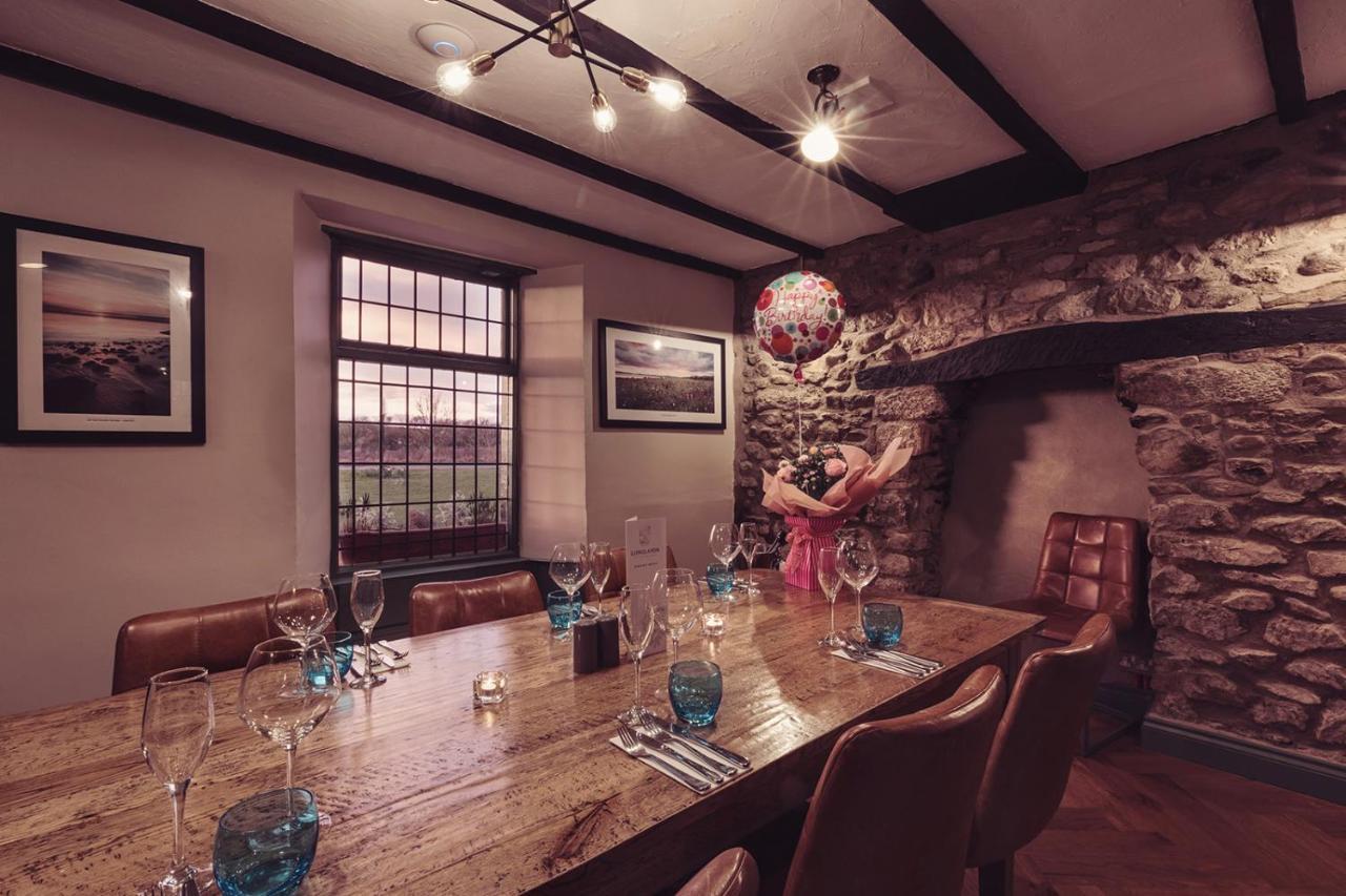 Longlands Inn & Cottages Карнфорт Экстерьер фото The restaurant at The Old Stamp House