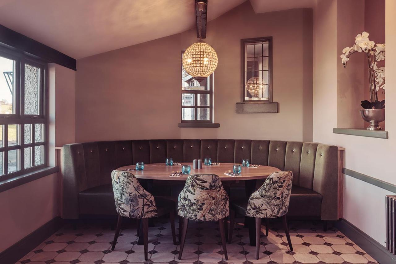 Longlands Inn & Cottages Карнфорт Экстерьер фото The restaurant's interior