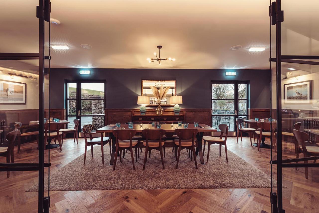Longlands Inn & Cottages Карнфорт Экстерьер фото The restaurant at the hotel