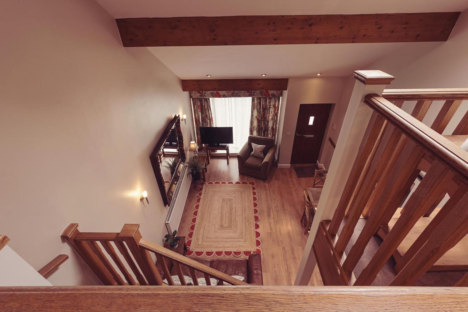 Longlands Inn & Cottages Карнфорт Экстерьер фото Interior of a chalet
