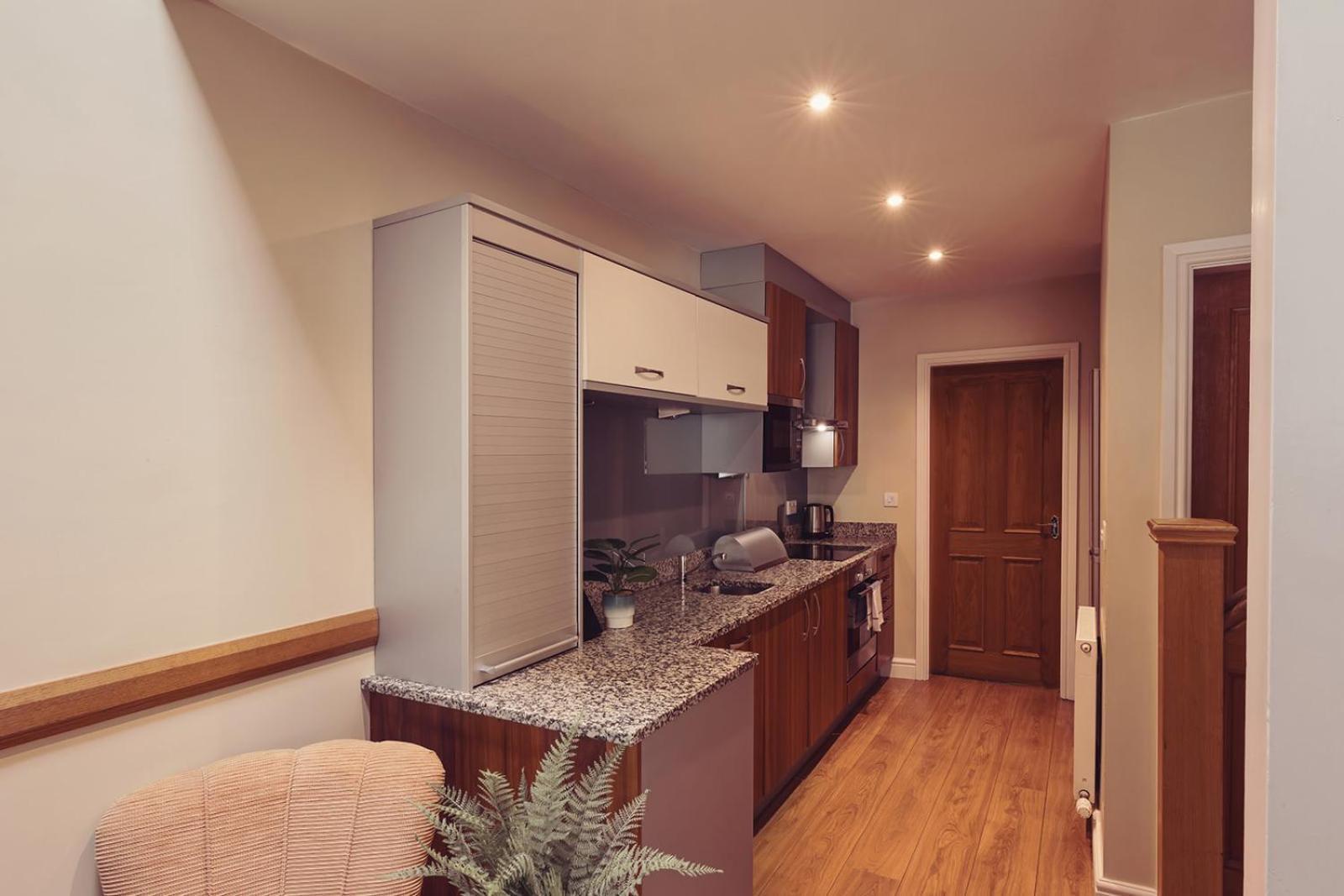 Longlands Inn & Cottages Карнфорт Экстерьер фото A typical studio apartment